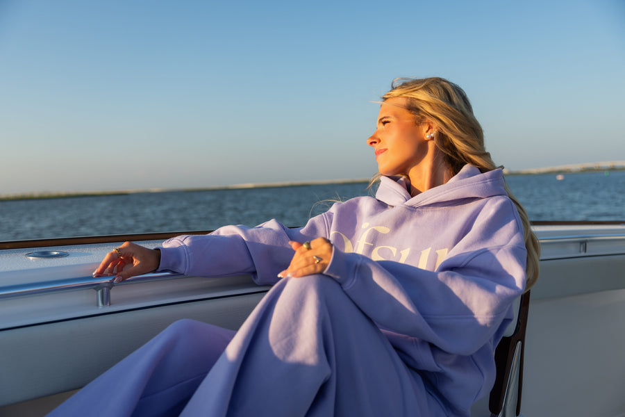 Offsure Wide-Leg Pant in Light Purple, lounging on the boat